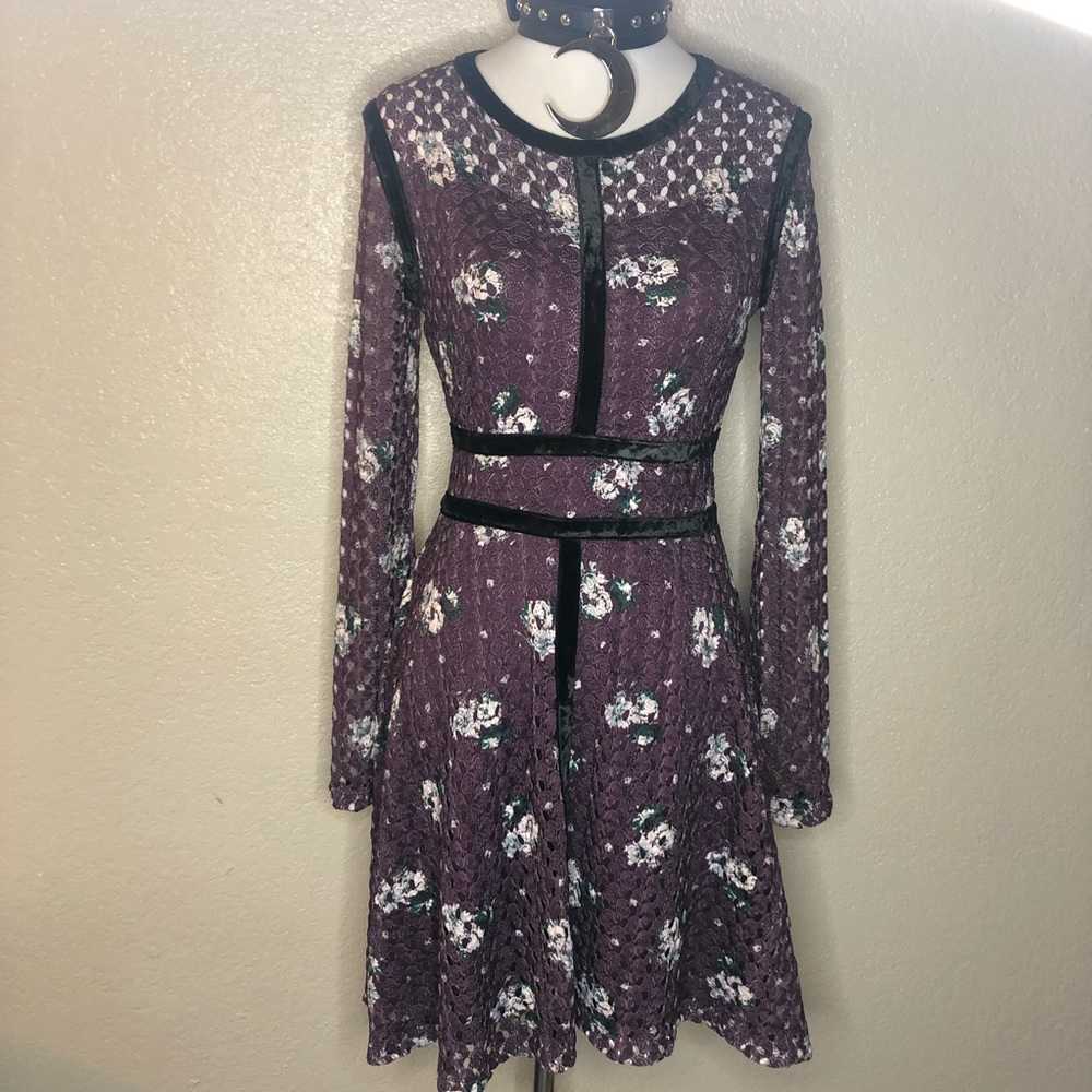 Purple lace dress with white floral design